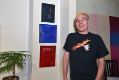 Paul Gardner with Robert Houle paintings, 2012.